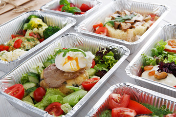 Healthy food in boxes, diet concept.