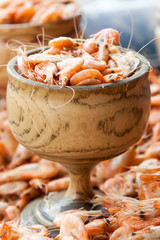 handful boiled of shrimps on a table