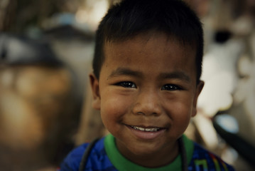 Cute little boyl have white teeth and smiling,asian child