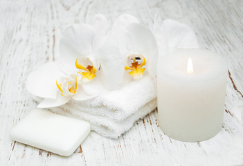 Candle, orcids and towels