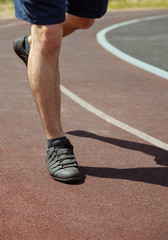 Unrecognizable young man running