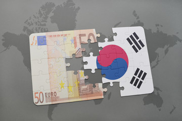 puzzle with the national flag of south korea and euro banknote on a world map background.