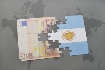 puzzle with the national flag of argentina and euro banknote on a world map background.