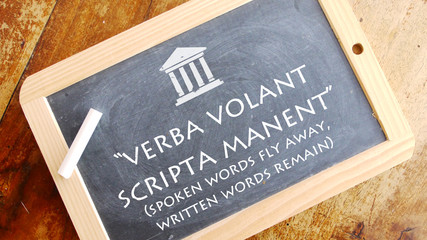 Verba volant scripta manent. Latin phrase meaning 
