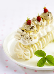 meringue cake with fresh berries on white background