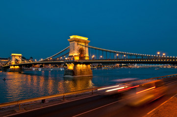 View of the famous chain bridge in Budapest at night.