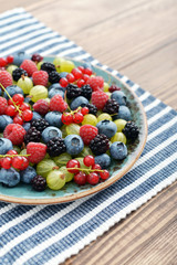 berries on wooden background