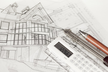 architecture blueprints -  house, compass, electronic calculator & mechanical pencil