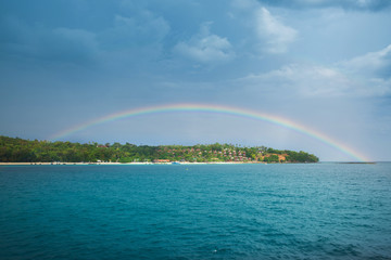 Rainbow over limestone cliffs around Phi-Phi island