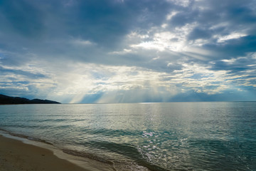 Beams of light go through clouds