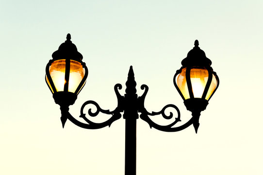 Beautiful vintage Street antique style lamp post with effect of