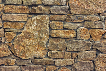 background texture of wall made of stone, tinted photo