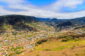 Fototapeta na wymiar View from Pico do Facho viewpoint over the Machico valley, Madeira, Portugal