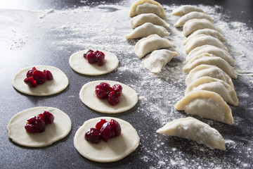 The homemade dumplings with cherries