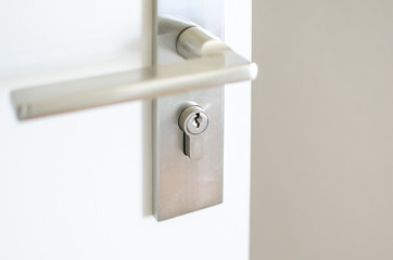 Obraz premium Handle steel knob on the door