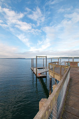 Fototapeta na wymiar Joemma Beach State Park Pier and Boat Dock in the early morning near Tacoma Washington USA