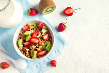 Homemade granola with strawberry and kiwi
