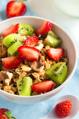 Homemade granola with strawberry and kiwi