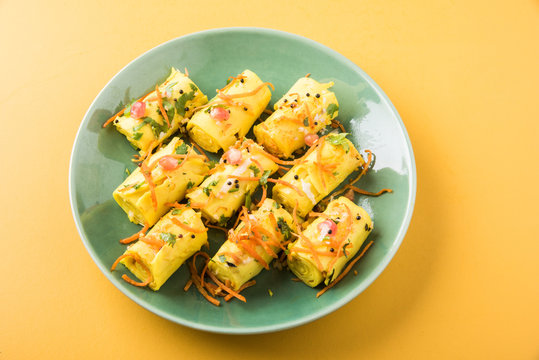 Indian gram flour snack snack called Khandvi or suralichya vadya, selective focus