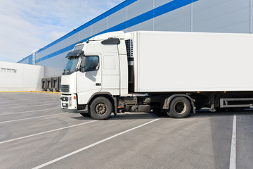 Truck while loading in a big distribution warehouse