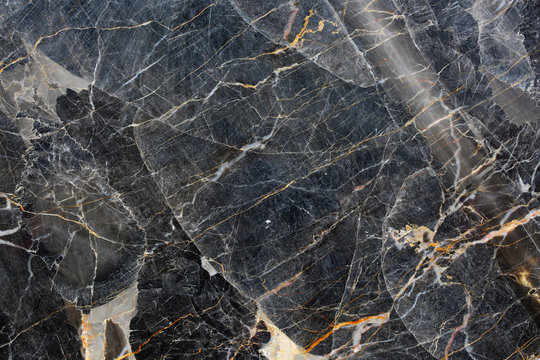 Dark gray marble (Russia Gold) with a beautiful pattern. Nature background for design.