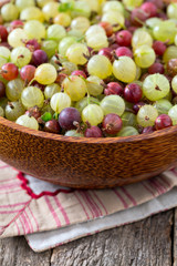 gooseberries on wooden surface