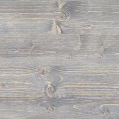 Grey wood texture with knotholes