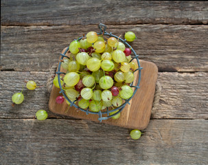 gooseberries on wooden surface