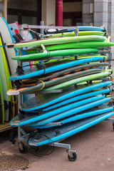 Surf boards in a stack