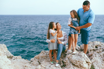 Family on the sea shore