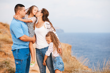 Family on the sea shore