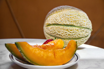 Melon slices on a plate