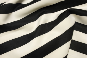 This is a photograph of Black and White striped fabric