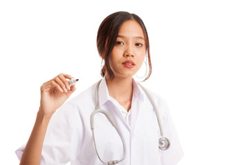 Young Asian female doctor with red marker focus at marker  isolated on white background