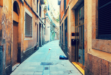Fototapeta na wymiar Old narrow street of european city. Barcelona