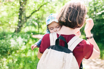 young family with a child on the nature