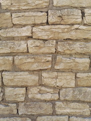 Old brick wall texture yellow close up 