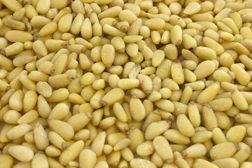 This is a photograph of Pine nuts background