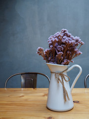 Dried flowers and mint mold on the table.