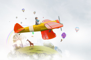 Girl flying old plane .  Mixed media