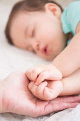 baby sleep on the bed