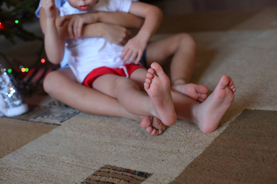 Baby feet in mommy's hands