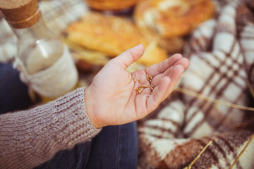 Children hand with a wheat grains