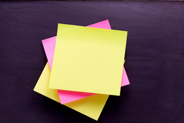 colorful sticky notes with shade on blackboard
