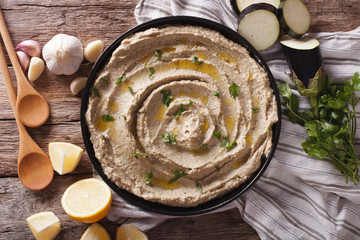 Arabic food baba ghanoush close-up and ingredients. Horizontal top view   © FomaA