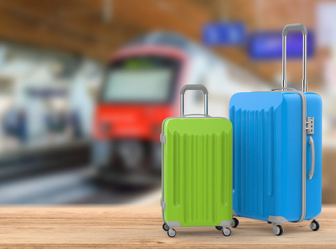 green and blue luggages with transportation background