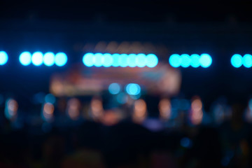 Out-of-focus shimmering background of a concert hall stage set 