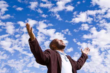 African American Man With His Hands Raised