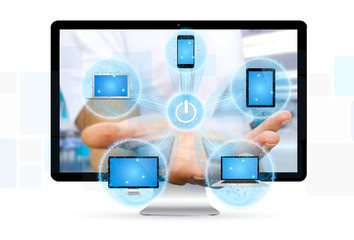 Colorful tech devices and icons applications in businessman hand