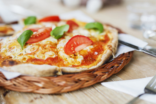 Close-up of pizza served on the plate
